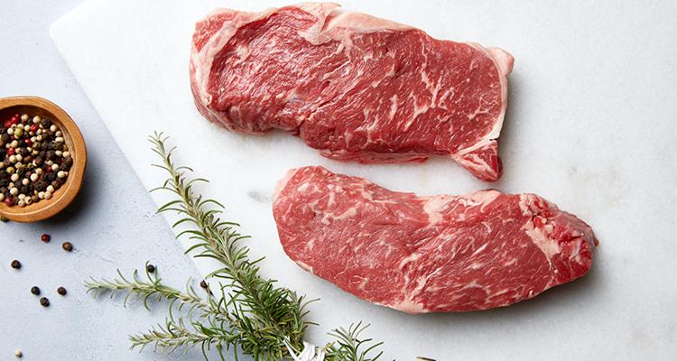 Raw Strip Steaks